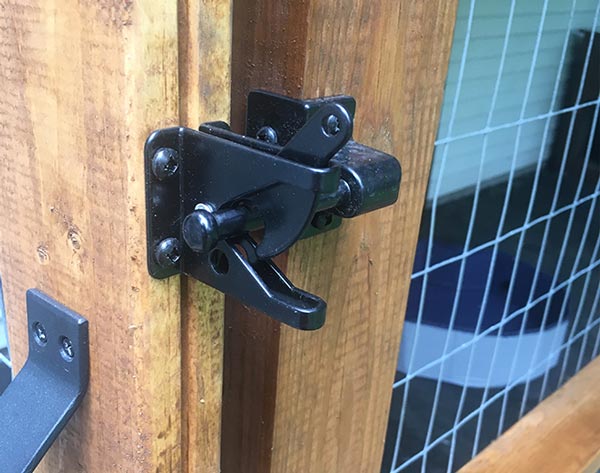 husky nose proof latch, installed outside the kennel- no more carabiner needed.